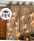Heavy Duty Stainless Steel Sliding Door Rollers U Groove Caster Wheels on a wooden barn door with string lights background.