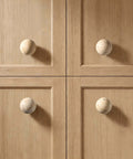 Natural Travertine Round Cabinet Knobs 1.2 Inch Diameter 4 Pack Dope Upgrade For Cabinets And Drawers mounted on wooden cabinet