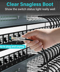 Plugging Cat6a Patch Cable 1.5ft into a switch with clear snagless boot, part of a 24 pack slim 28AWG UTP Ethernet cables for data centers.