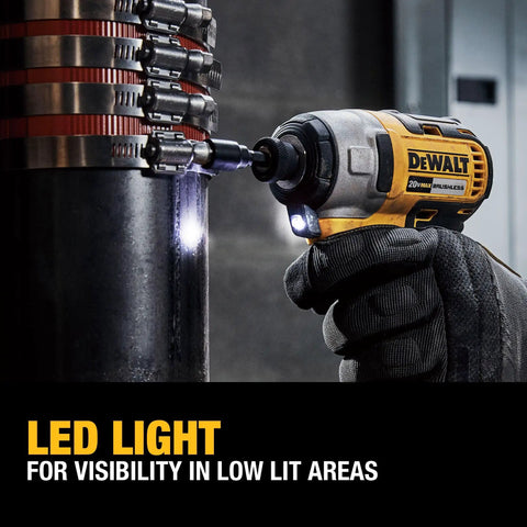 20V Max Brushless Impact Driver with One Quarter Inch Hex shown with LED light on, tightening fastener in dimly lit area
