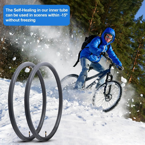 Cyclist riding in snow with Two Pack 700C Self Sealing Bike Tubes 35C To 43C Puncture Resistant AV48mm Valve in foreground.