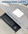 Large Height Adjustable Under Desk Keyboard Tray With Straight Up Smooth Glide Slide Out Platform Zero Hassle Ergonomic Typing Setup Rich Matte Black Computer Drawer showing keyboard and mouse beneath desk.