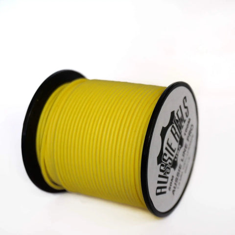 Yellow spool of Stiff UHMWPE Spearfishing Reel Line 175ft 1.9mm 680lb Load, heavy duty double jacketed shooting line on white background.