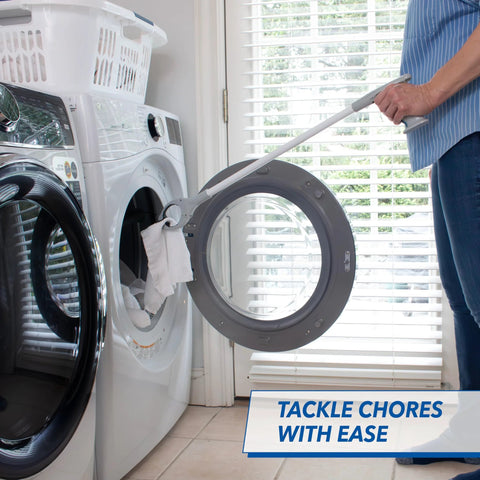 Front view of a 32-inch grabber reacher with gray handle and white shaft used to lift a cloth near a washer.