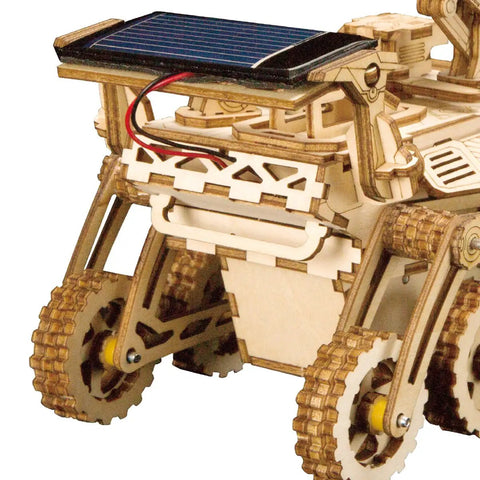 Close-up of Solar Powered Cars Kit with Movable 3D Wooden Puzzle Toys, showing rover wheels and solar panel detail