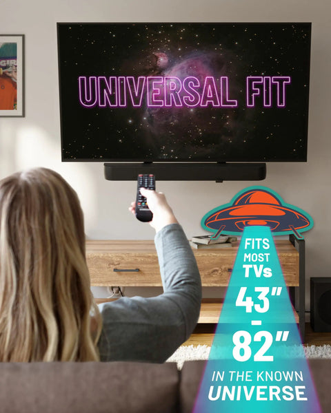 Heavy Duty Full Motion TV Wall Mount Bracket For Flat Screens Up To 82 Inches visible with remote control and TV display.