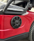 Red 48 Volt 105 Ah Lithium Electric Golf Cart With Spacious Built In Insulated Cooler For Smooth Course Cruising showing rear speaker and wheel.
