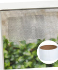 Window Screen Repair Tape Kit Self Adhesive Patch installed on window screen with glass fiber texture, greenery background.