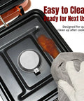 Cleaning the drip tray of Two Burner Portable Camping Stove With Carry Bag No-Fuss 17000 BTU Propane Camp Stove For Camping Outdoor Cooking