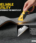 Auto Reload Utility Knife With 10 Preloaded SK5 Blades cutting carpet, showcasing sharp blade and ergonomic design.