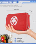 Red mini travel first aid kit zippered pouch with white medical cross emblem, held in hand.