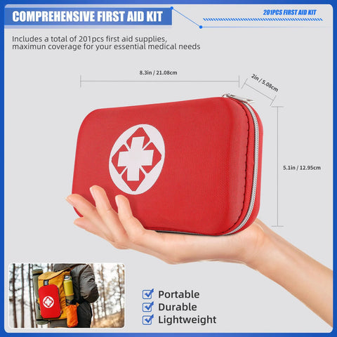 Red mini travel first aid kit zippered pouch with white medical cross emblem, held in hand.