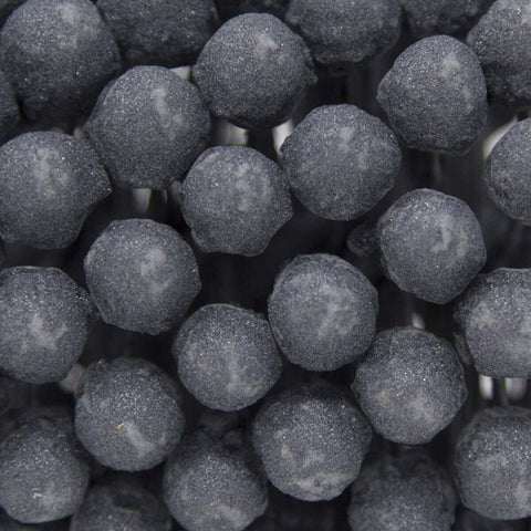 Close-up of the Flex-Hone Four And One Eighth Inch Diameter 240 Grit Silicon Carbide Honing Tool bristles for mild steel.