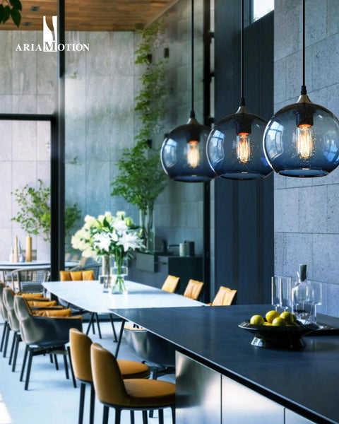 Hand Blown Glass Pendant Light For Kitchen Island Capri Blue Globe Seeded Bubbles Lit Eight Point Seven Inch Diameter