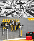 Heavy Duty Metal Screwdriver Organizer Wall Mount With 43 Holes Pliers And Small Tool Holder Rack installed in garage