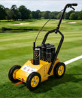 Heavy Duty Adjustable Line Striping Machine For Lawns, Parking Lots And Sports Fields on a golf course, yellow body, black handle.