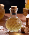 Glass bottle sealed with Assorted Tapered Cork Stoppers Set, 25 Pieces, Five Sizes From 17Mm To 63Mm, Natural Wood Wine Bottle Plugs