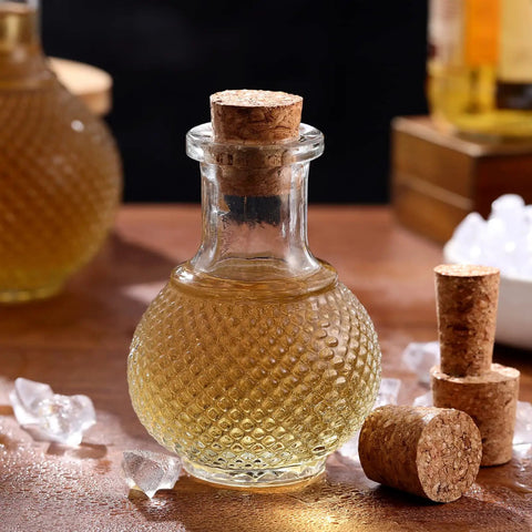 Glass bottle sealed with Assorted Tapered Cork Stoppers Set, 25 Pieces, Five Sizes From 17Mm To 63Mm, Natural Wood Wine Bottle Plugs