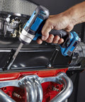 Hand holding a power drill with hex head bit, working on an engine using Heavy Duty Hex Head Allen Wrench Drill Bit Set Featuring 33 Pieces Crafted From Tough As Nails S2 Steel With Magnetic Tip And Quarter Inch Shank Covers Metric Sae And Security Torx Sizes For Knockout Home Repairs.