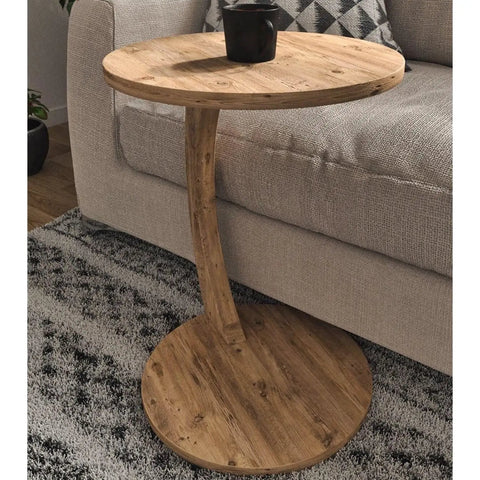 C Shaped End Table On Wheels For Small Spaces, Round Side Table For Sofa And Bedside With Faux Marble Finish, shown beside a sofa.