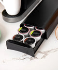 Black Single Serve Coffee Pod Organizer Drawer for Grab and Go Mornings Holds 12 Pods under coffee maker on counter.