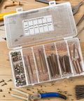 49 Piece M6 40 to 80mm Hex Socket Screw and Barrel Nut Set for Furniture Repair, home improvement tools on wooden table.