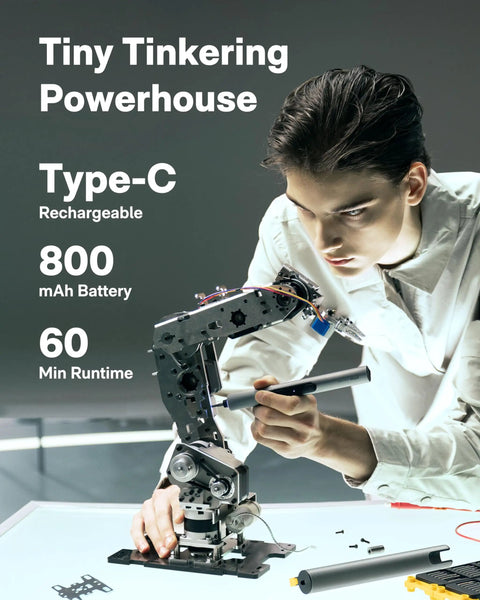 Person using Mini Electric Screwdriver Kit With 56 Bits Three Torque Settings Auto Stop Protection LED Light for fine assembly work.