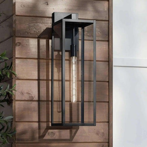 Modern Industrial Outdoor Wall Light Fixture in Mystic Black with 27 Inch Clear Glass Panels mounted on wooden exterior wall