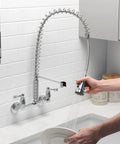 Dual Handle Commercial Style Wall Mount Kitchen Faucet With Pull Down Nozzle Chrome High Arc Spout 1.8 GPM Flow Spray And Stream