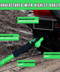 Kinetic Recovery Rope 1 Inch By 30 Foot Green Heavy Duty Snatch Strap With Two Soft Shackles For Off Road Trucks SUVs Jeeps ATVs Trailers 48,500 Lbs Breaking Strength with vehicle attachment shown on muddy terrain