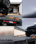 Flatbed trailer hauling with Ultimate Axle Tie Down Kit Pro Series Heavy Duty Webbing securing vehicles with orange straps.