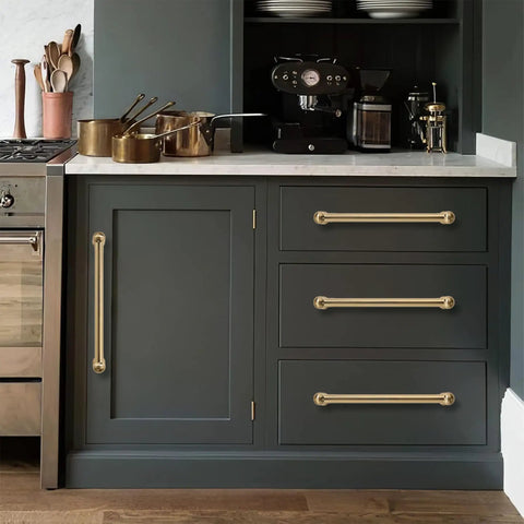 2 Pack 6 And A Quarter Inch Hole Center Brushed Brass Cabinet Pulls Beefy Durable Heavy Duty Solid Warm Brass Cabinet Handles shown on a dark kitchen cabinet.