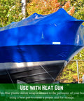 Polyethylene Shrink Wrap Roll 7 Mil Thick 14 Foot By 125 Foot Blue Marine Grade Film For Pro Shop Boat And Jetski Winter Storage With Heat Gun covering a boat.