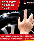 Hand applying All In One Tire Shine And Cleaner Kit With 16 Ounce Spray For Long Lasting Gloss And Weatherproof Finish to tire