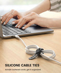 Silicone Cable Ties 10 Pack Cord Organizer With Secure Lock Buckle in use on a laptop cable on a desk