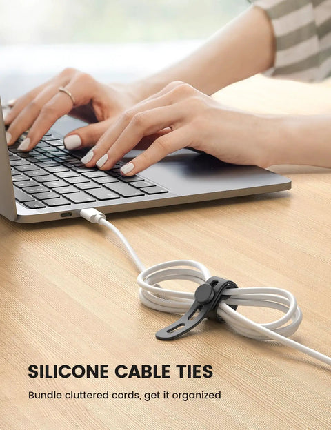 Silicone Cable Ties 10 Pack Cord Organizer With Secure Lock Buckle in use on a laptop cable on a desk