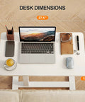 Total Game Changer Over Bed Table With Smooth Rolling Casters And No Sweat Pneumatic Height Adjustment Super Spacious Work Surface showing desk dimensions 27.6" x 15.7" with laptop and coffee.