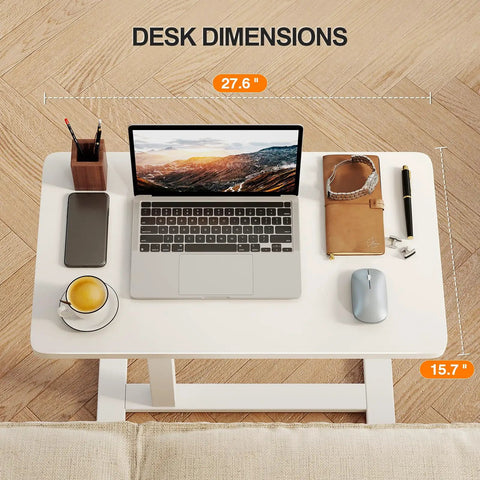 Total Game Changer Over Bed Table With Smooth Rolling Casters And No Sweat Pneumatic Height Adjustment Super Spacious Work Surface showing desk dimensions 27.6" x 15.7" with laptop and coffee.