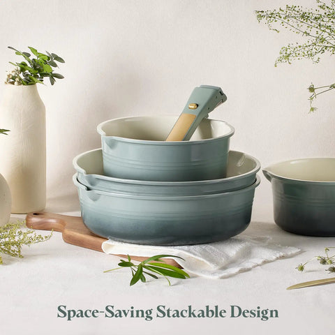 3 pots from Titanium Nonstick 20 Piece Cookware Set With Detachable Handles stack together with one handle visible