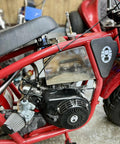 Stainless Steel Mini Bike Gas Fuel Tank for Coleman B200 B200RSV installed on red mini bike frame, showcasing durable mount