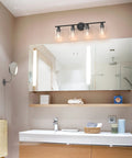 Bathroom interior with Matte Black 4 Light Vanity Light Over Mirror Dope Modern Sconce With UL Certified E26 Base, mirror, and sink.