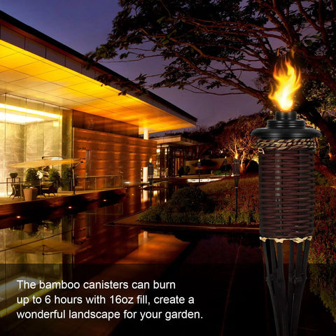 16oz Replacement Torch Canisters Pack Of 4 For Bamboo Lantern Outdoor Torches illuminating a modern backyard with garden lighting.