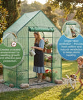 Woman watering plants inside Outdoor Walk In Greenhouse 55 By 28 By 78 Inches With Three Tier Shelves Tool Free Setup UV Protected