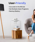 Dual Outlet Indoor Digital Timer For Lamps And Fans, 7 Day Programmable Plug In Timer, plugged on wall near lamp and woman