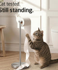 Cat beside sturdy floor standing toilet paper holder built like a tank in SUS 304 stainless steel rustproof with a 2x heavier base.