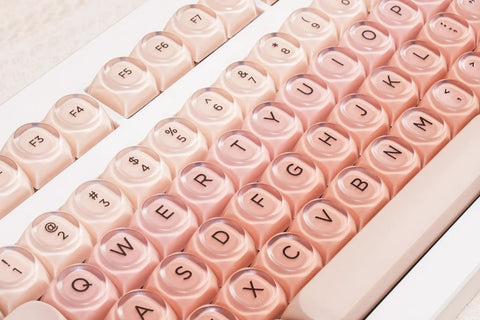 Clean 80 Percent Wireless Mechanical Keyboard In Soft Pink Creamy Build Featuring Jelly Moa Profile Transparent Keycaps close-up view