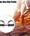 Cyclist using bike with Non Slip Exercise Bike Pedals With Straps Half Inch Spindle, 12.7mm Spindle, Black, Adjustable Toe Straps For Indoor Stationary And Outdoor Cycling, Secure Grip And Durable Pedal Set For Any Bike.
