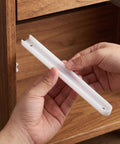 Top Shelf White Drawer Slides Kit Smooth Rolling Noise Free Furniture Hardware shown being installed in a cabinet.