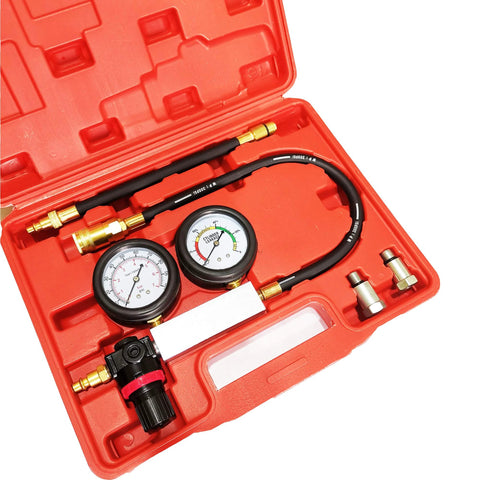 Engine cylinder leak-down tester kit in red case with two gauges, hoses, and brass adapters