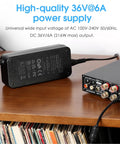 36V 6A Power Supply GaN Adapter delivers 216W high efficiency for amplifiers and active speakers on wooden shelf